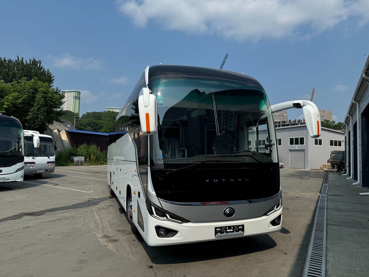 Новинка 2025: улучшенный доступ к запасному колесу в автобусе ZK6128H